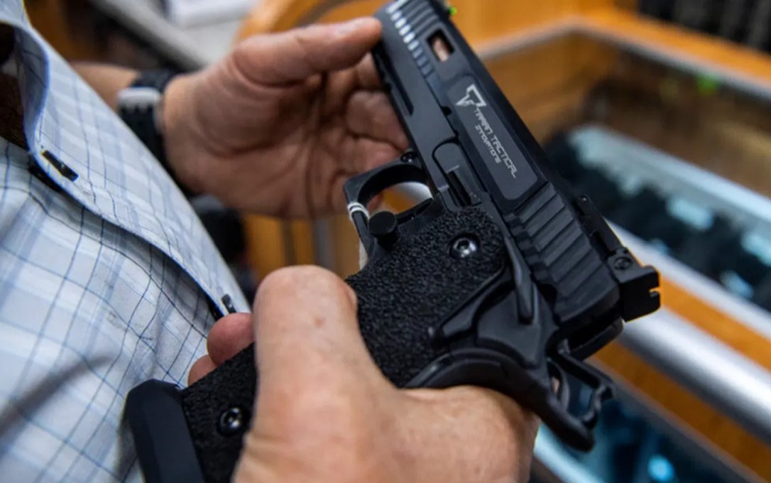  A customer checks out a hand gun that is for sale and on display at SP firearms on June 23, 2022, in Hempstead, New York. New York can continue to enforce laws banning firearms in sensitive locations, a federal appeals court ruled Friday, Dec. 8, 2023 in its first broad review of a host of new gun rules passed in the state after a landmark Supreme Court ruling last year.