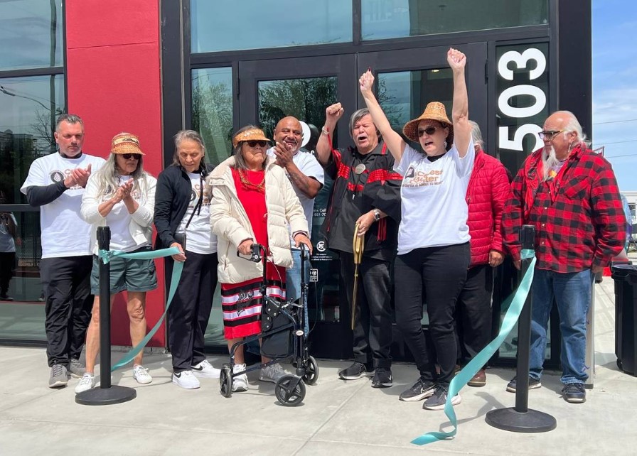 Members of the Puyallup Tribal Council celebrate the opening of the Cedar Wellness Center near the Tacoma Dome on Friday, May 3. scarter@thenewstribune.com Simone Carter 