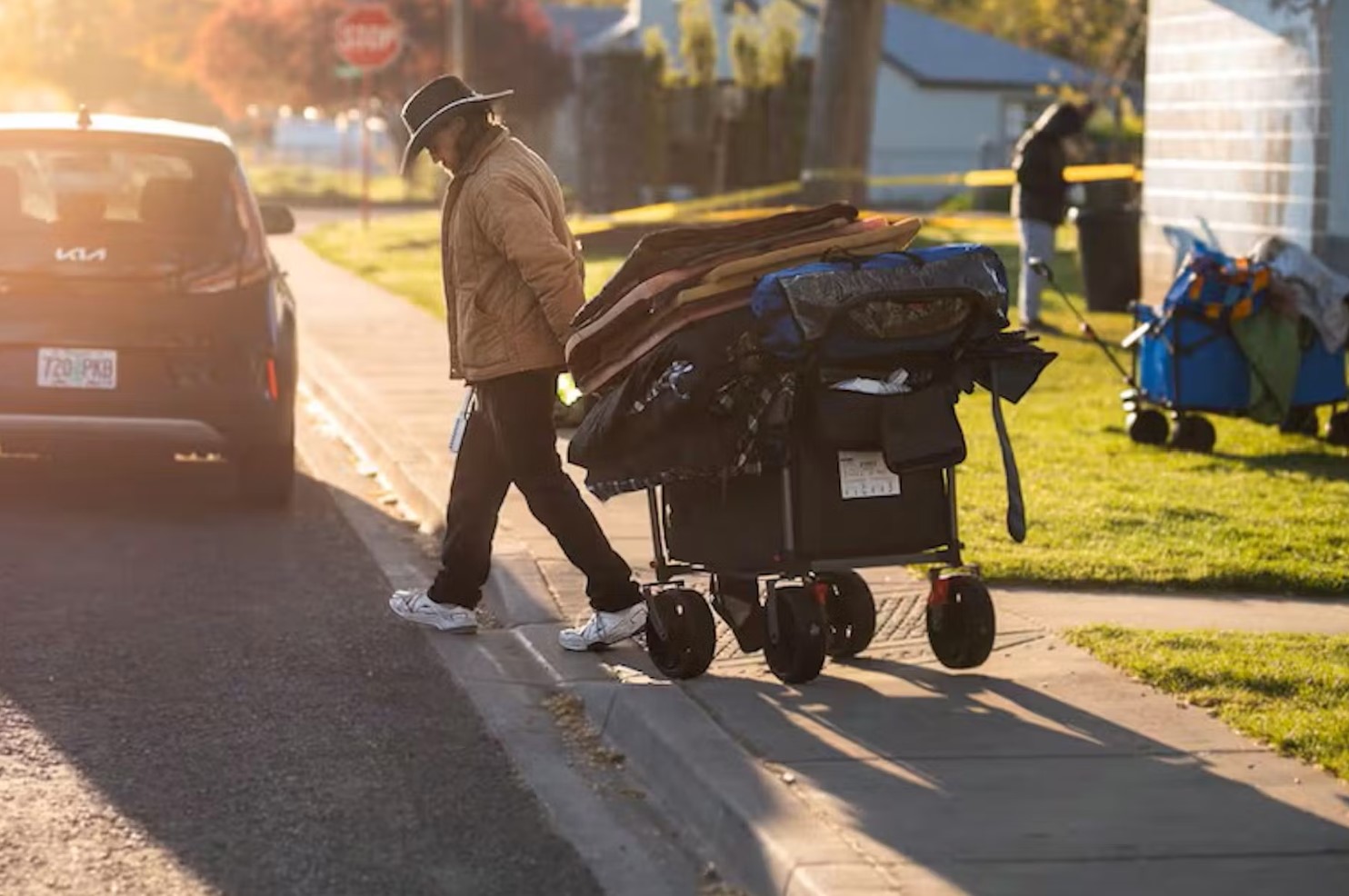 Every morning, John Parke packs up his tent and sleeping bag, piles them onto his wagon, and hauls all of his belongings off the grass at Foster Park, before the sprinklers go off at 8 a.m.