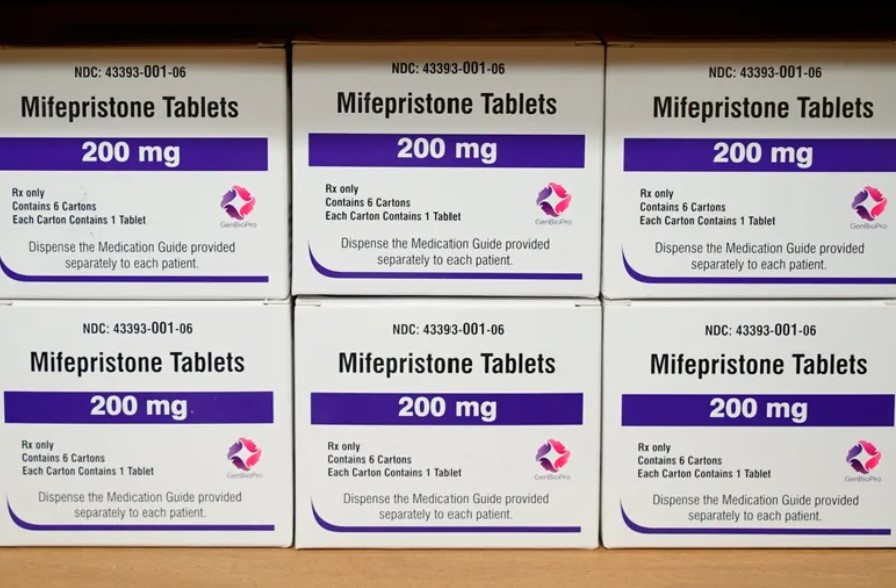 Boxes of the drug mifepristone sit on a shelf. (AP Photo/Allen G. Breed, File)