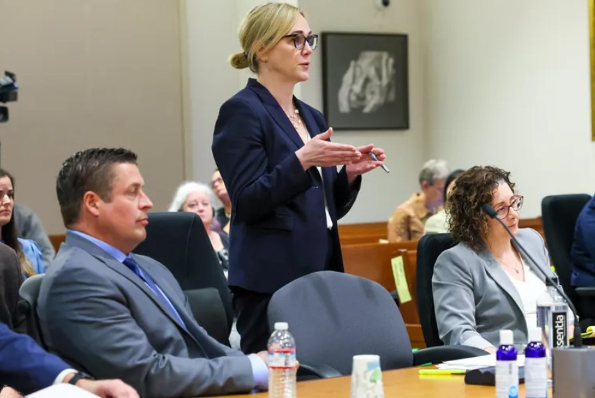 Defense attorney Emma Scanlan addresses the court with Jeffrey Nelson, left, and Kristen Murray during his trial June 26 at the Maleng Regional Justice Center in Kent. Nelson’s attorneys are requesting a new trial. (Kevin Clark / The Seattle Times)