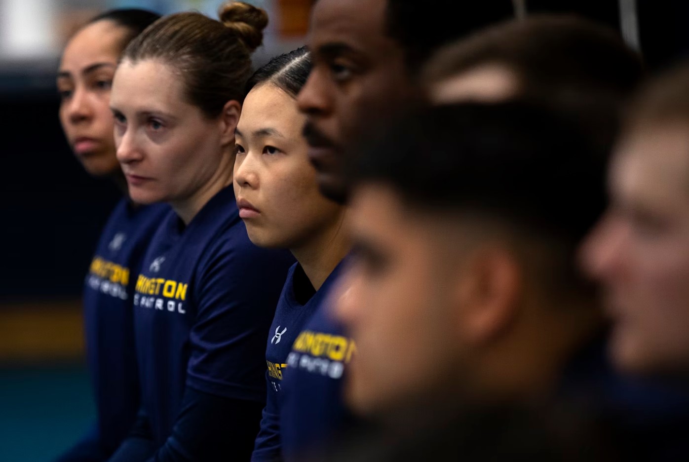 Jisu Choi, 23, center, listens before a training exercise during State Trooper basic training on Thursday, July 11, 2024, at the Washington State Patrol Academy in Shelton.