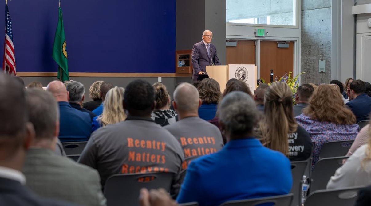 Washington Gov. Jay Inslee signed an executive order in Tacoma on Monday to improve the state’s effort to help individuals make a successful reentry into their community when they leave prison. (Courtesy of Gov. Jay Inslee’s office)