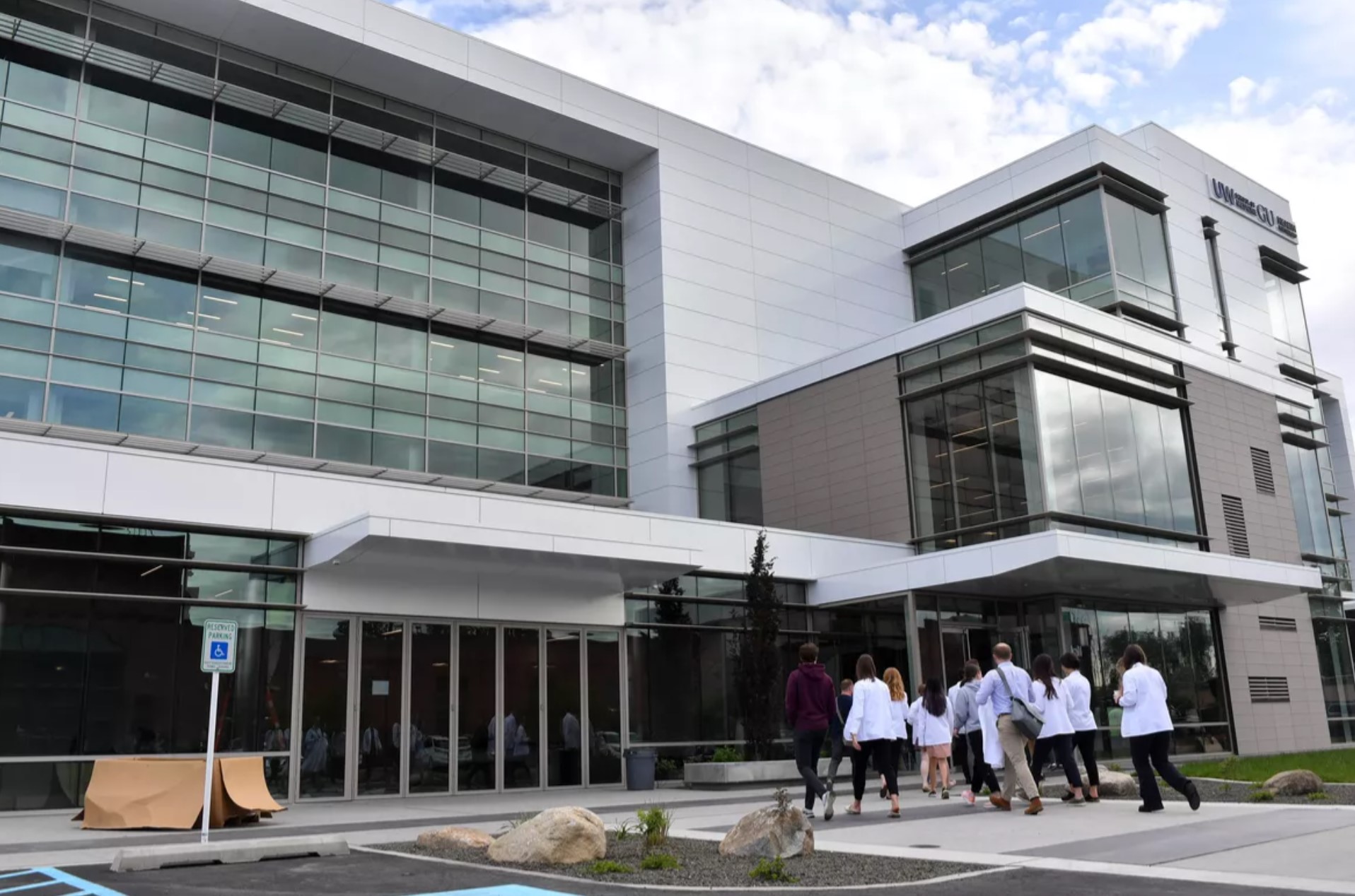 Students attending the University of Washington-Gonzaga University Health Partnership tour its 840 building in June 2022. Now, the UW School of Dentistry for its Regional Initiatives in Dental Education, partnering with Eastern Washington University, has agreed to lease the fourth floor and construct an oral health training center for expanding this summer and having more students train to become dentists, primarily for rural areas. 