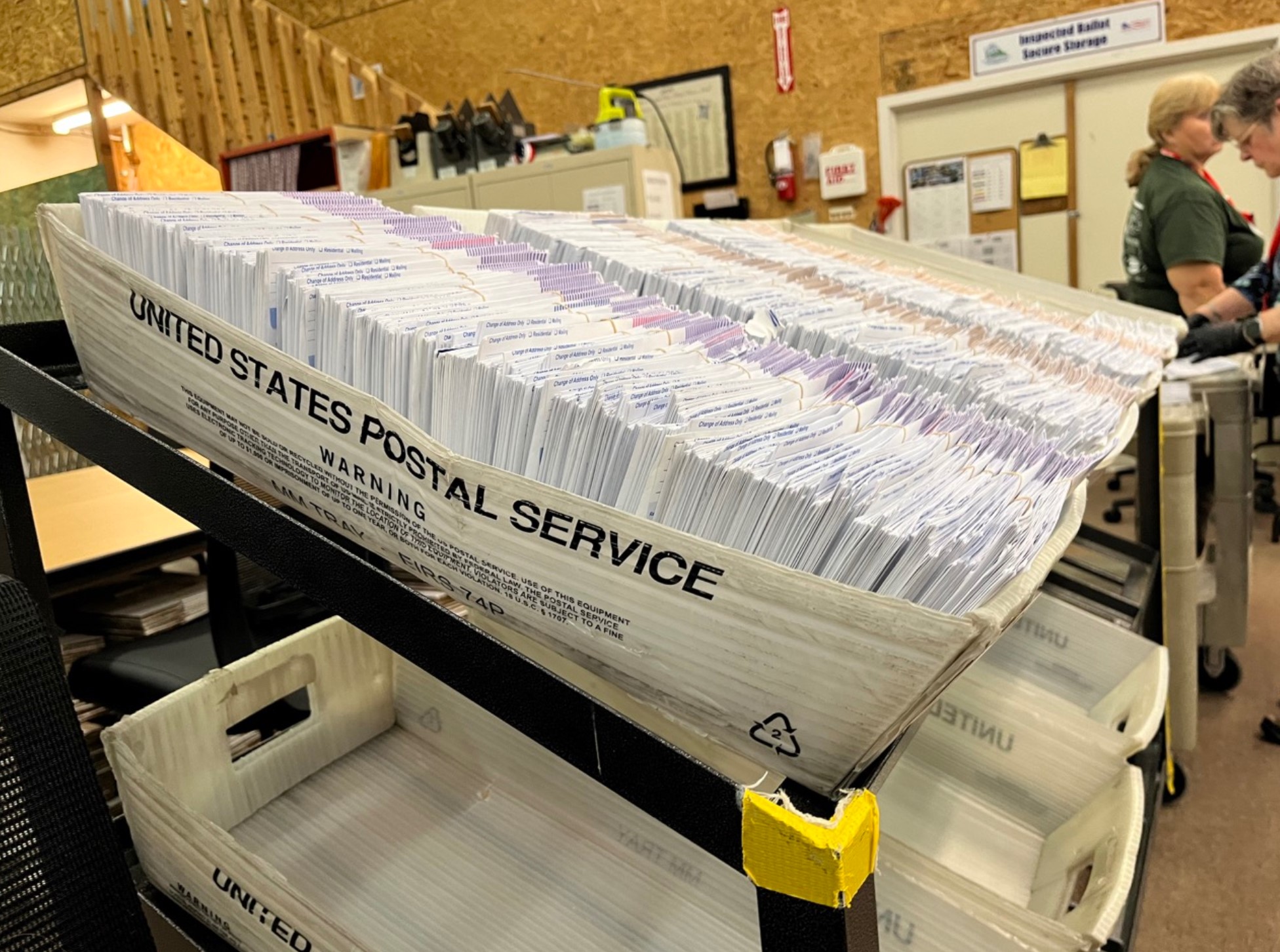 Ballot envelopes sit in the Thurston County elections center. (Laurel Demkovich/Washington State Standard)