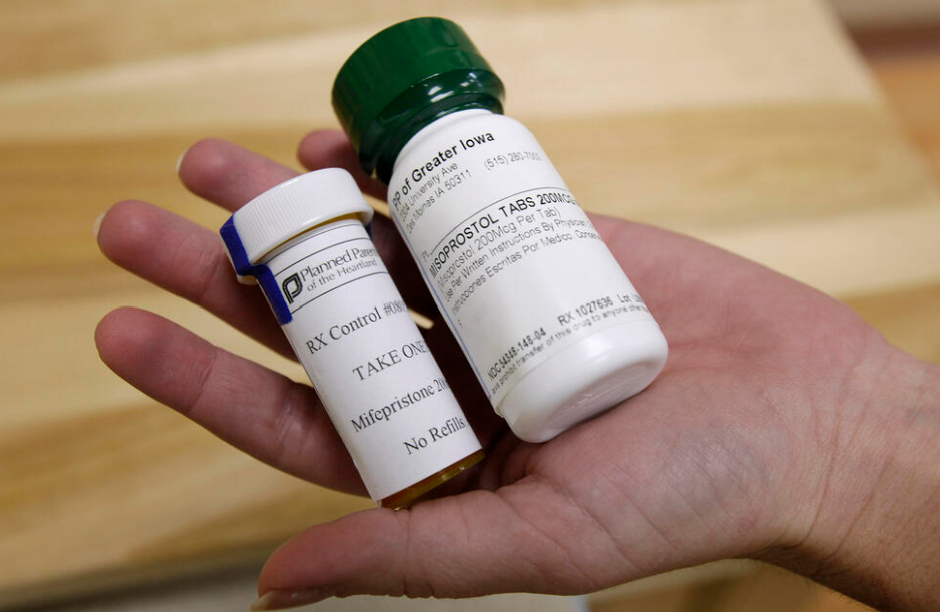 Bottles of abortion pills mifepristone, left, and misoprostol, right, at a clinic in Des Moines, Iowa, Sept. 22, 2010. In 2023 a Texas judge ruled that the U.S. Food and Drug Administration should rescind approval for mifepristone, but a ruling in a second lawsuit in Washington will prevent the FDA from implementing any new restrictions on the drug in 18 states and the District of Columbia.