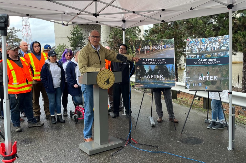  Gov. Jay Inslee released his 2024 budget proposals surrounding housing and homelessness programs at the site of a former encampment in Seattle last December. (Laurel Demkovich/Washington State Standard)