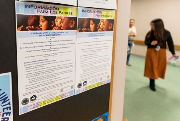 Information for parents is posted in the school lobby in both English and Spanish Oct. 23 at Lewis and Clark Elementary School. World photo/Jacob Ford. 