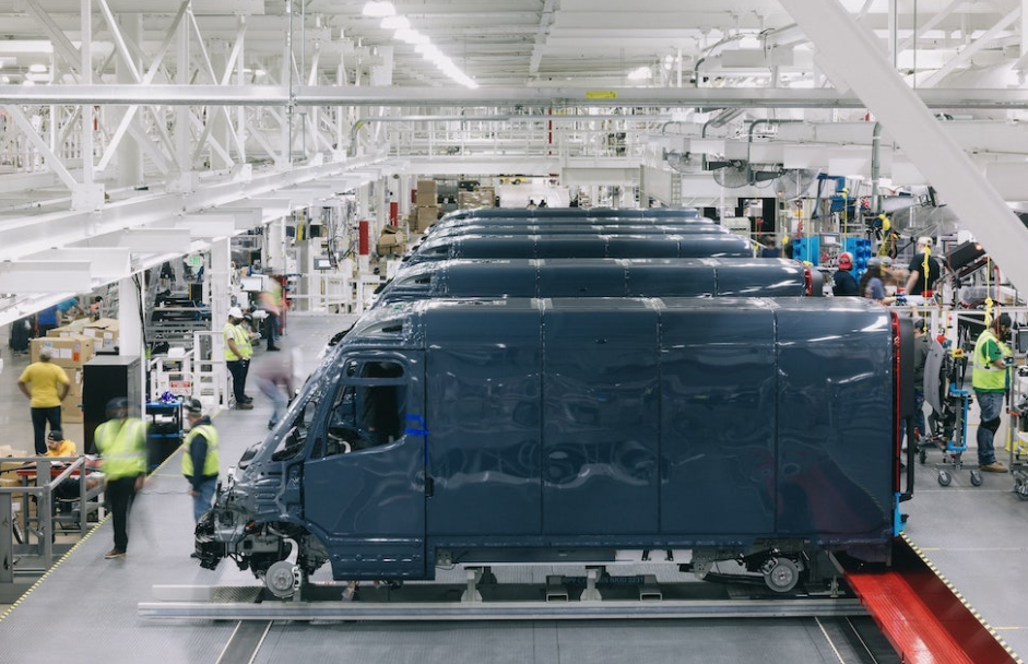 Employees work at a Rivian electric vehicle factory in Normal, Ill., in 2021. (Courtesy of Rivian)