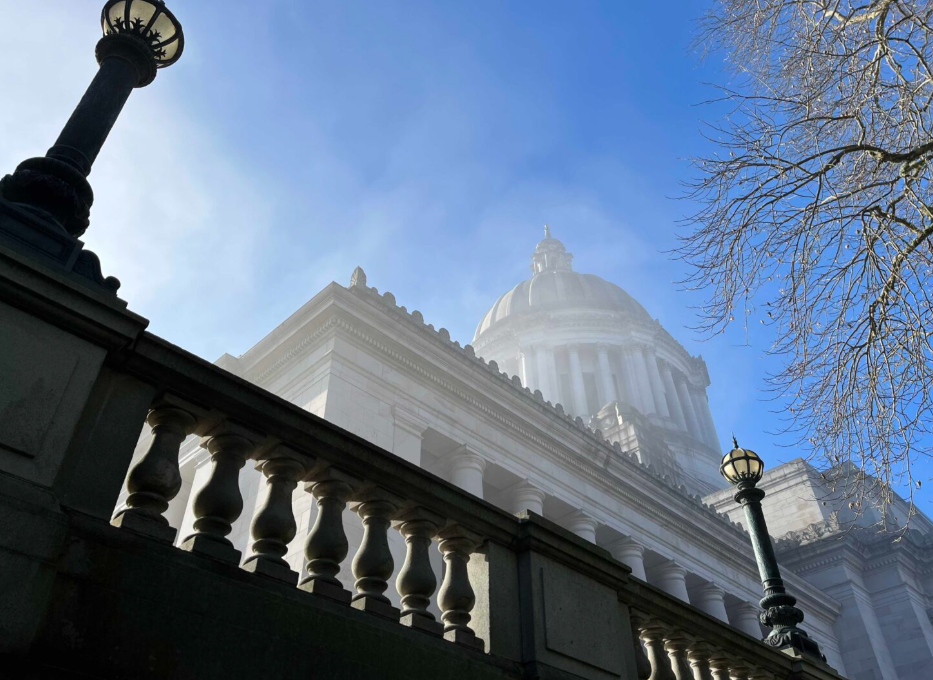 A view of the Washington state Capitol building in Olympia, obscured by a slight mist, Jan. 27, 2025. (Photo by Bill Lucia/Washington State Standard)