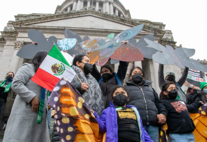 A group from Wenatchee gathered in Olympia to advocate for immigrant rights on Jan. 30. Clockwise from left, Liz Oropeza Palacios, Ivon Lopez Ramirez, Maria Gonzalez, Grace Mondragon and Zoe Mondragon. (Credit: Renee Diaz / NWPB)