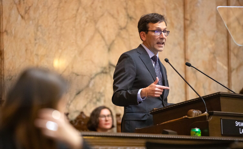 Gov. Bob Ferguson delivers his inaugural address after being sworn in on Jan. 15, 2025, at the Washington state Capitol in Olympia, Wash. Ferguson has said he'll veto any budget that does not include $100 million for police hiring. (Photo by Ryan Berry/Washington State Standard)