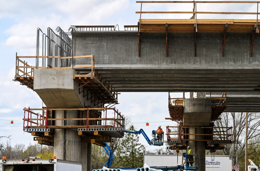 Crews work near Greene Street at Carlisle Avenue on the continuing construction of the state Department of Transportation’s North Spokane Corridor in 2024.
