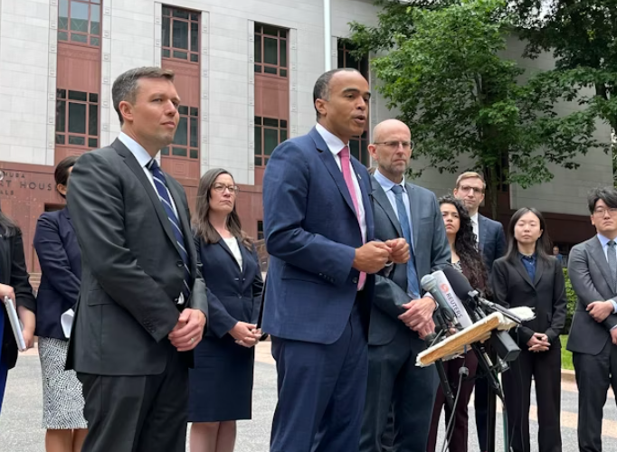 Washington Attorney General Nick Brown outside the Nakamura U.S. Courthouse on June 4, 2023. Solicitor General Noah Purcell, left, and Matt Adams of Northwest Immigrant Rights Project, right, presented oral arguments challenging President Trump's executive order on birthright citizenship before the Ninth Circuit court of appeals.
