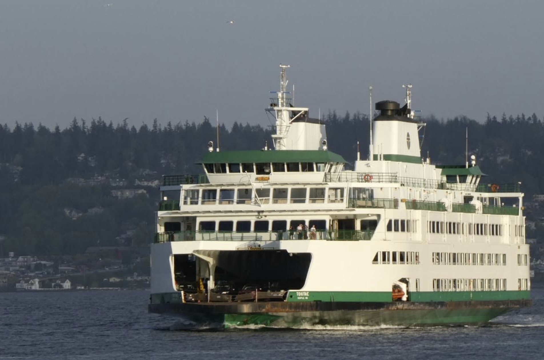 Washington State Ferries said it would deploy its new electric ferries first on the Mukilteo-Clinton run. The short route is currently served by diesel ferries like the Tokitae, seen here approaching Whidbey Island. (Photo by Tom Banse)