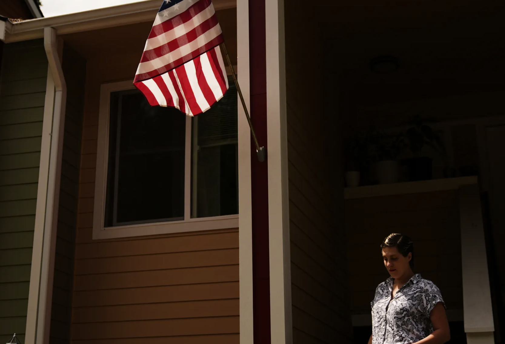 Havalah Hopkins, a single mother who lives in government-subsidized housing with her teenage son, poses for a portrait outside her apartment July 10 in Woodinville. (AP Photo/Lindsey Wasson)