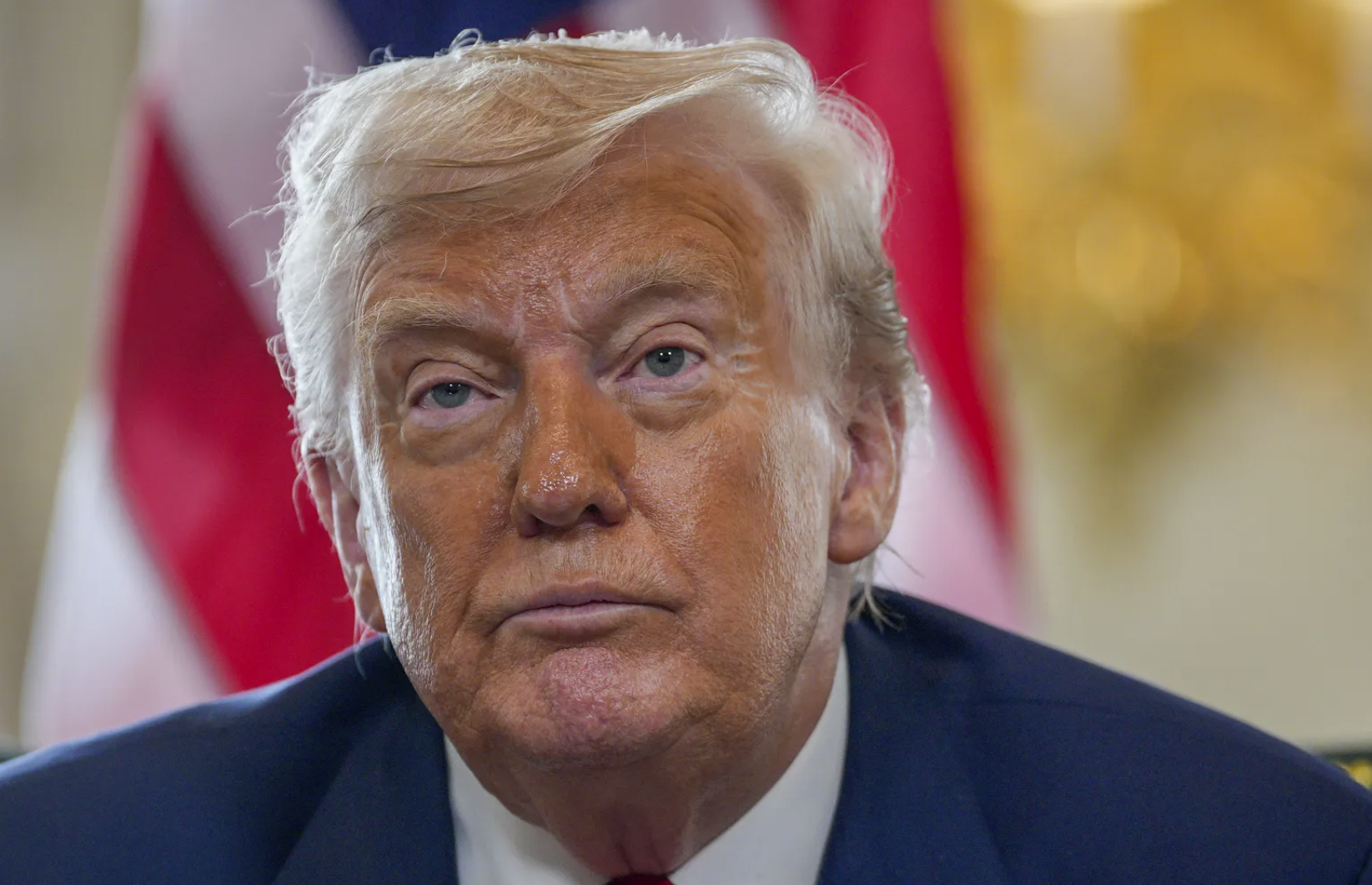 U.S. President Donald Trump talks to the media as he meets with British Prime Minister Keir Starmer at Trump Turnberry golf club in Turnberry, Scotland, Monday, July 28, 2025. (Christopher Furlong/Pool Photo via AP)