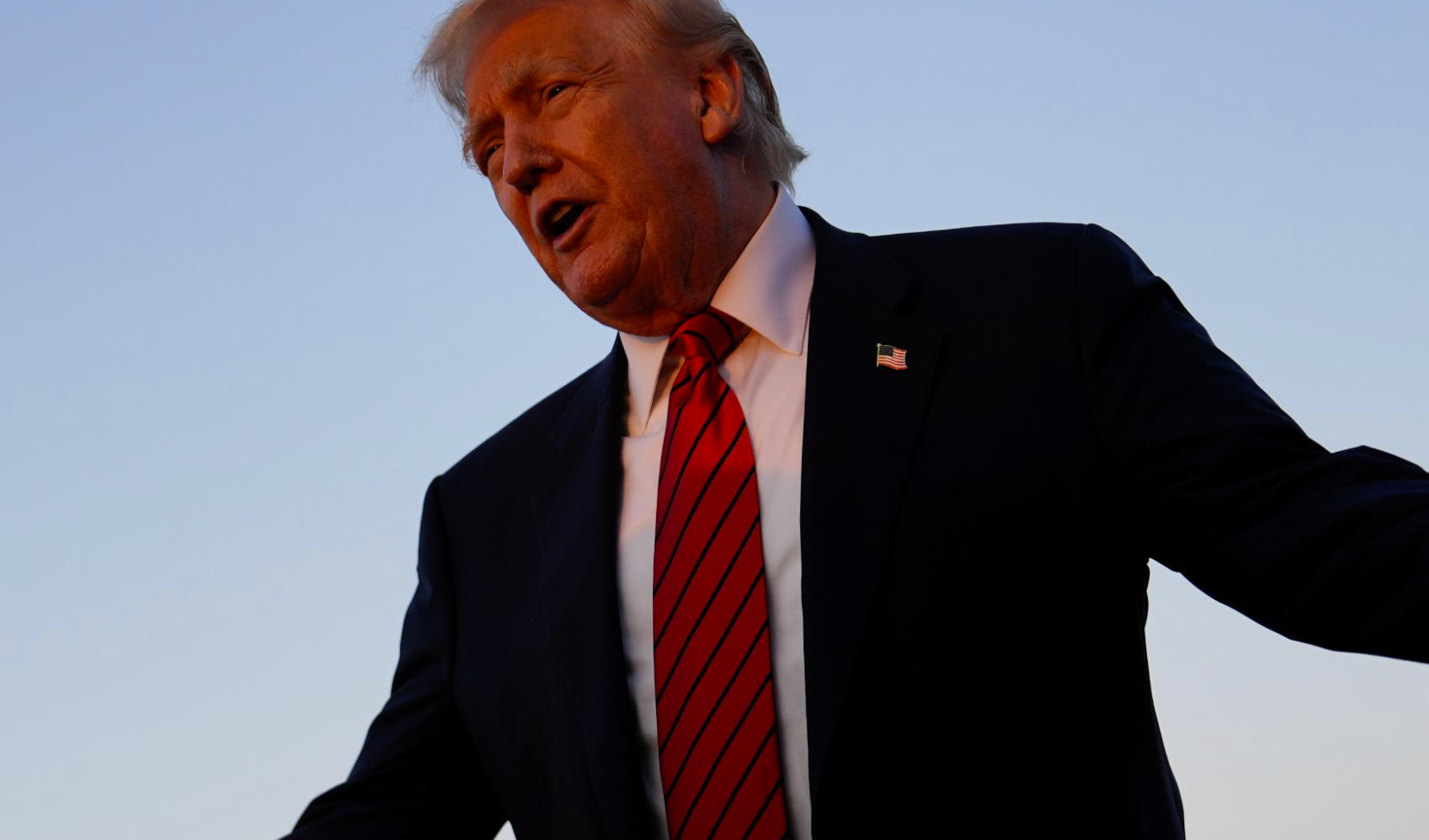 President Donald Trump speaks with reporters before boarding Air Force One at Lehigh Valley International Airport, Aug. 3, 2025, in Allentown, Pa.