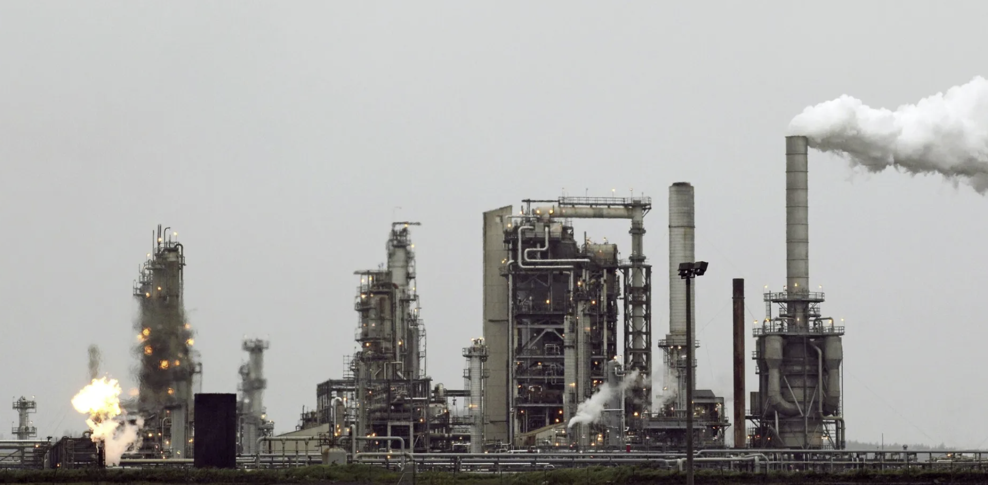 Washington’s Department of Ecology announced Tuesday that it would fine the Tesoro refinery near Anacortes $1.4 million for failing to safely handle toxic chemicals leftover as part of the refining process. (AP Photo/Ted S. Warren, 2010)