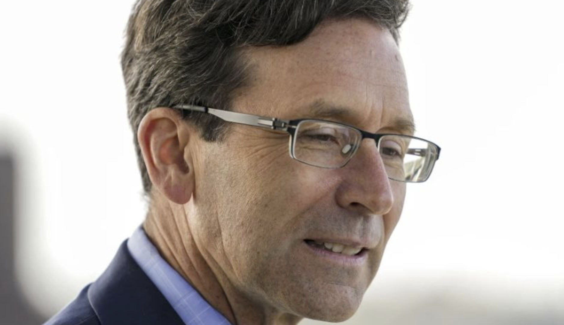 Washington Attorney General Bob Ferguson arrives for a bill signing on April 27, 2023, at the University of Washington’s Hans Rosling Center for Population Health in Seattle (Photo courtesy of AP:, Lindsey Wasson)