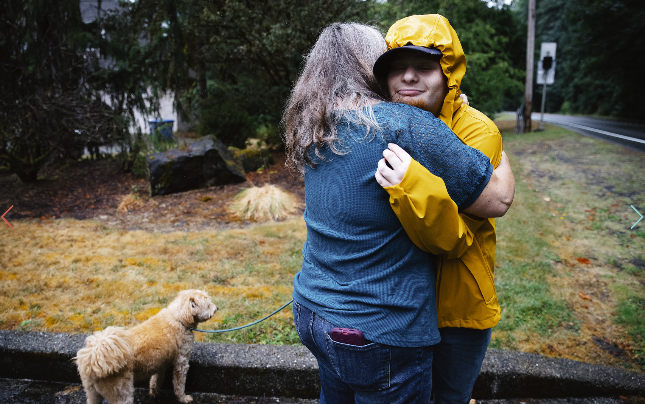 Rachel Nemhauser, left, hugs her son, Nate Nemhauser, 21, while waiting for a King County Metro Access bus outside of their home on Friday, August 15, 2025, in Bellevue.