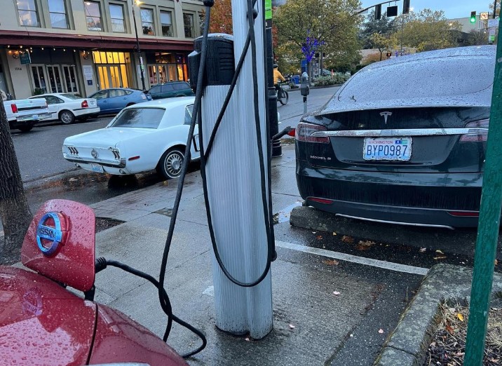 Electric cars use the city of Bellingham’s EV charging stations at Depot Market Square in downtown Bellingham in 2022. Robert Mittendorf The Bellingham Herald