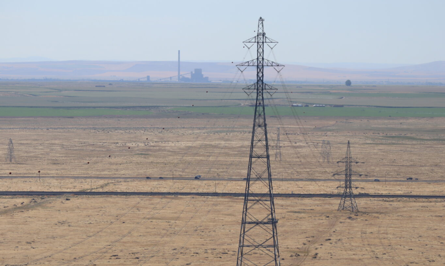 Portland General Electric’s Boardman energy complex in the distance, as seen from Crow Butte across the Columbia River in 2019. (Photo by Tom Banse)