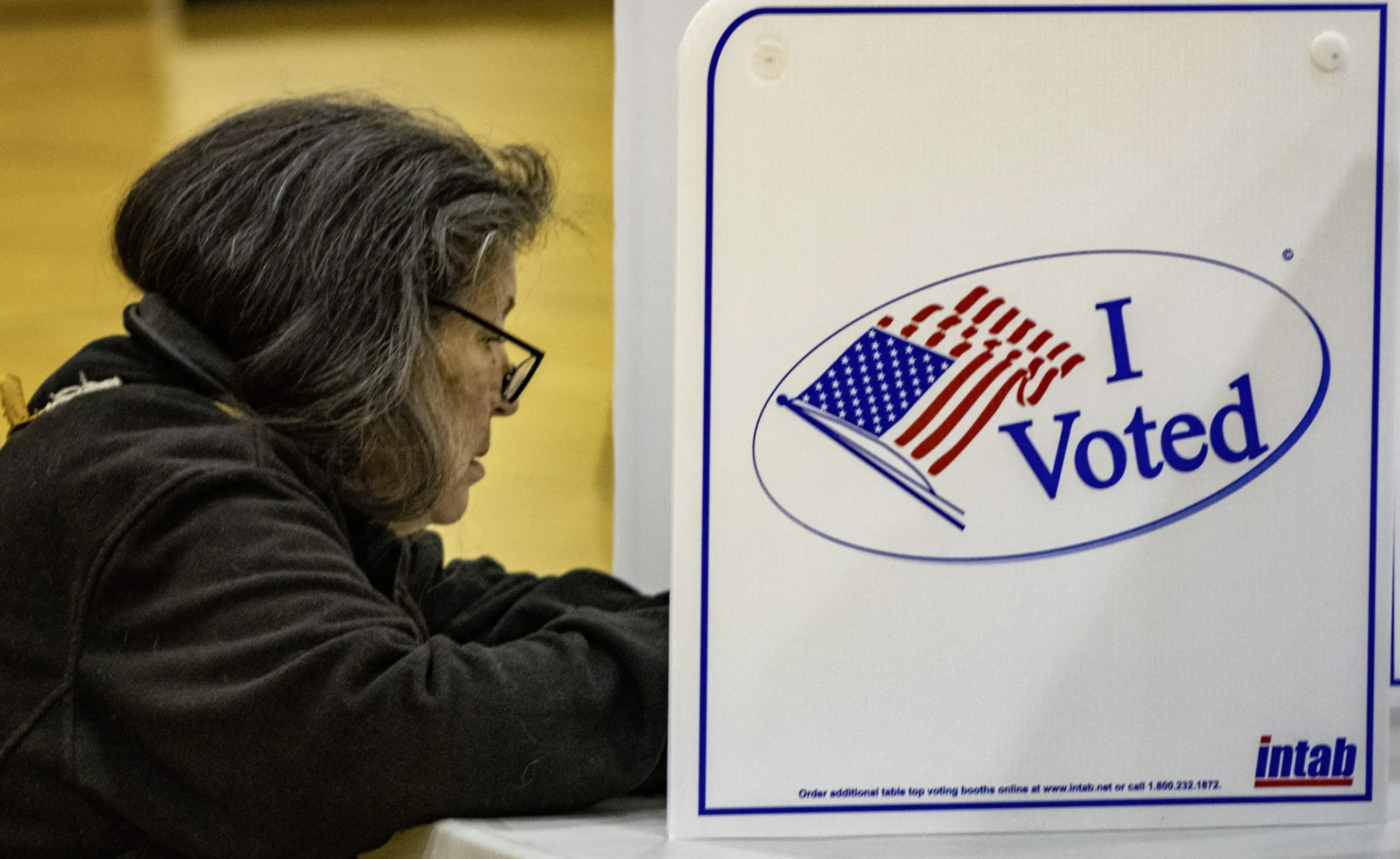 A woman casts her vote in Rapid City, South Dakota, in the 2024 election. Credit: Amelia Schafer/ICT