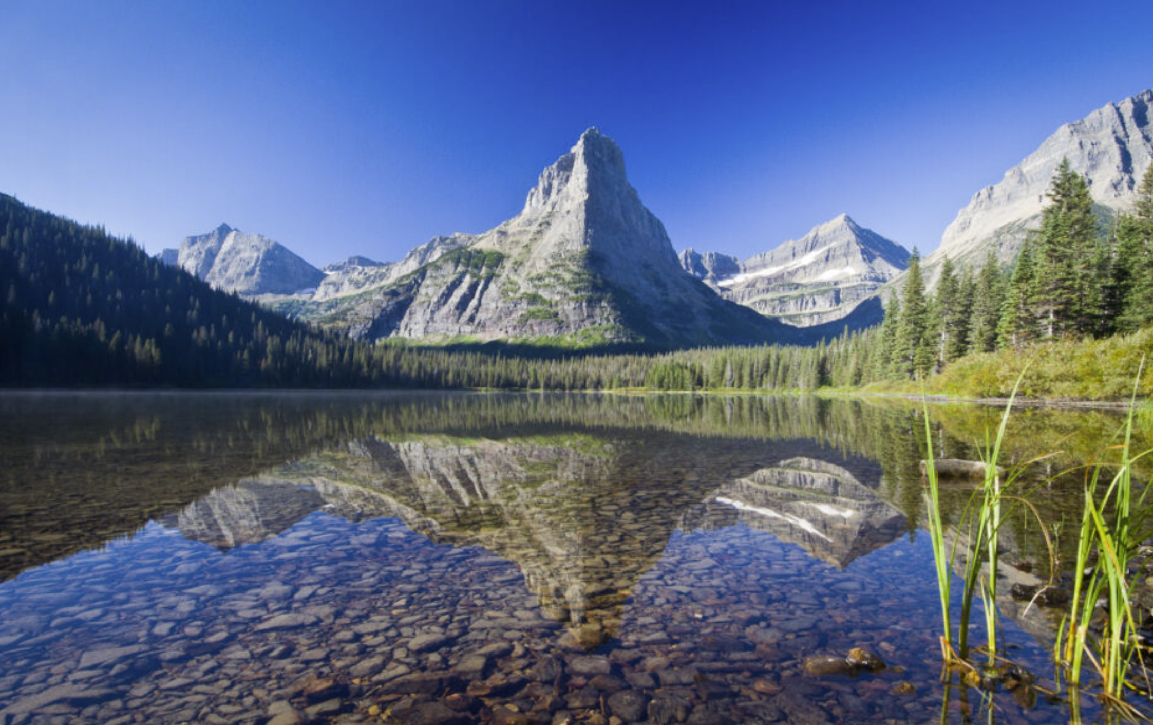 Plaintiffs in federal lawsuit allege harms to places like Glacier National Park due to climate change. Pictured is Glenns Lake in Glacier National Park (Photo by Jeff Pang via Glacier National Park and Flickr | CC-BY-SA 2.0).