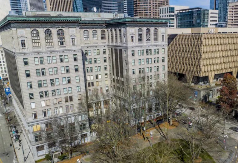 The King County Courthouse, left, in Seattle. Once police refer a case, prosecutors can file charges, decline to file charges, use the information as part of another case or return the case to police for further... (Daniel Kim / The Seattle Times, 2023)
