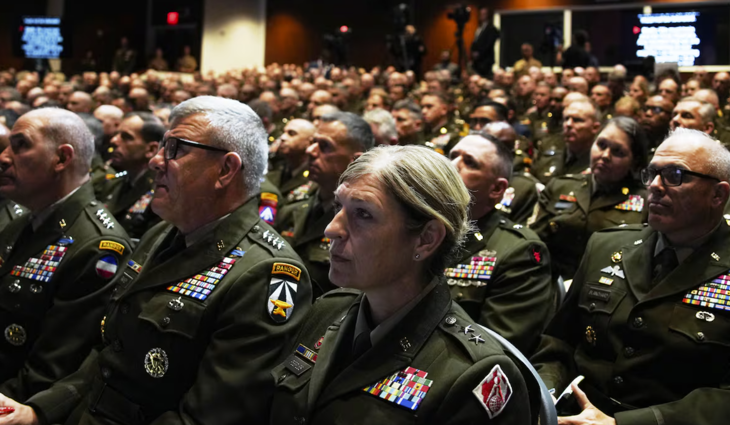 APTOPIX Pentagon Commanders Meeting - U.S. military senior leadership listen as President Donald Trump speaks at Marine Corps Base Quantico, Tuesday, Sept. 30, 2025 in Quantico, Va. (Andrew Harnik/Pool via AP)
