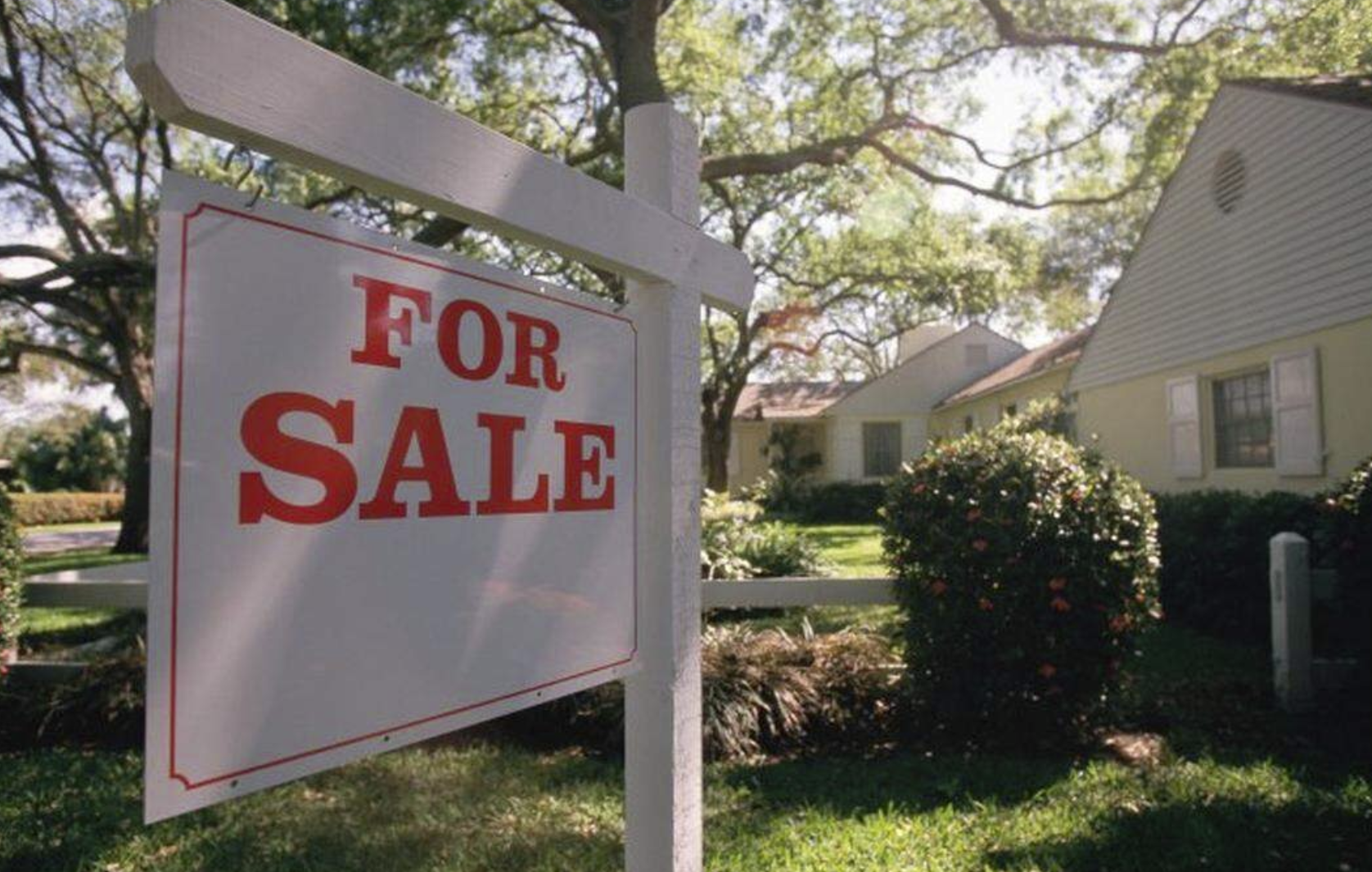 A “for sale” sign is displayed outside of a home. Washington state law does not require sellers to disclose if deaths, murders or other violent crimes occured on a property. Stockbyte Getty Images