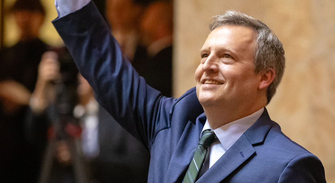 Washington state Commissioner of Public Lands Dave Upthegrove waves to the crowd during inauguration ceremonies at the Washington state Capitol, in Olympia, on Jan. 15, 2025.