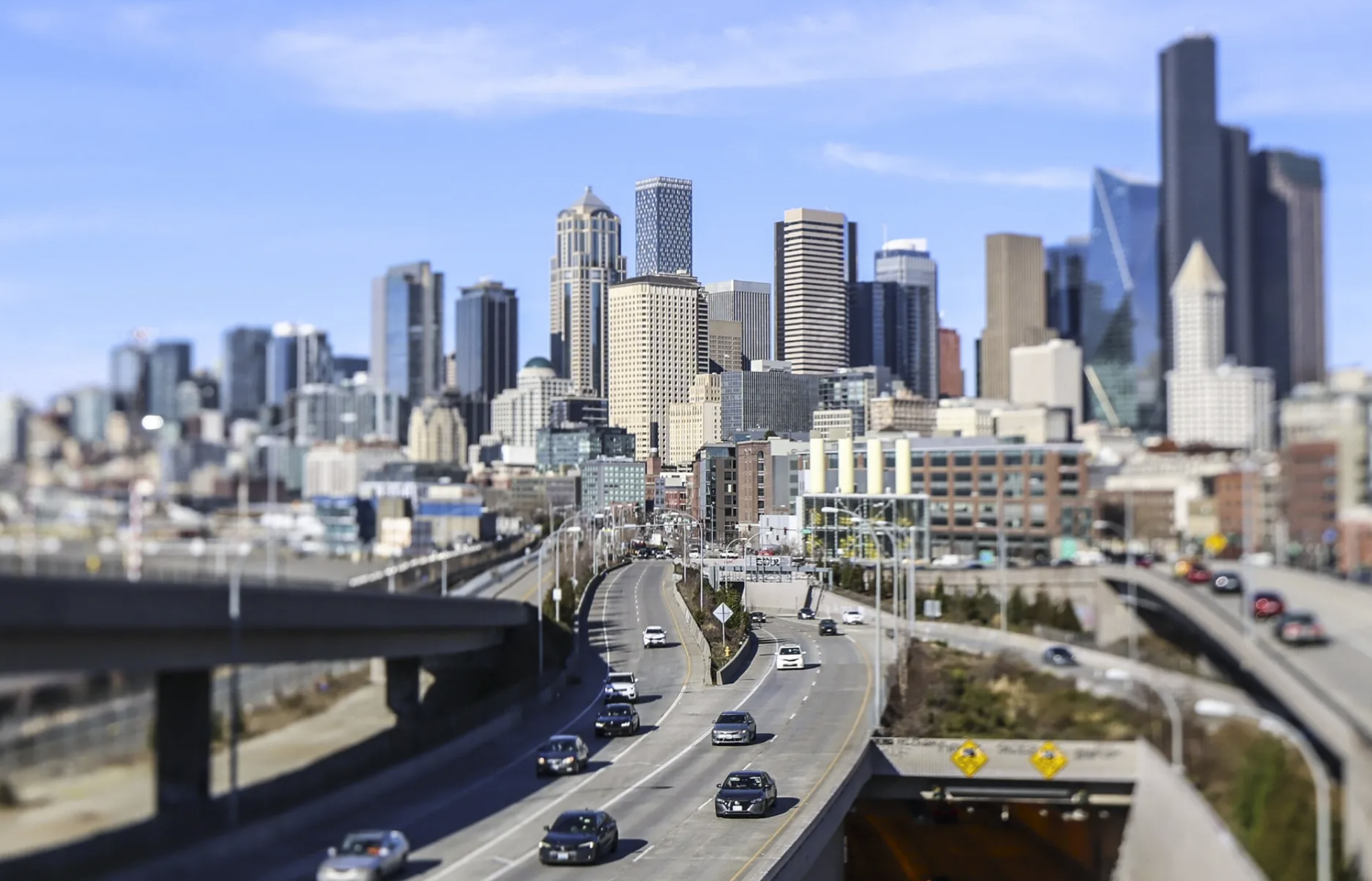The Emerald City is seen through a tilt-shift lens in February. New data shows in Washington, there were nearly as many residents who are second-generation residents as there were immigrants. (Kevin Clark / The Seattle Times)