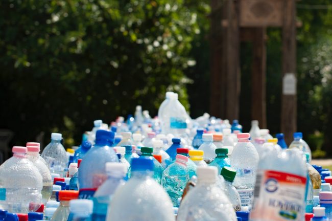 plastic bottles on ground