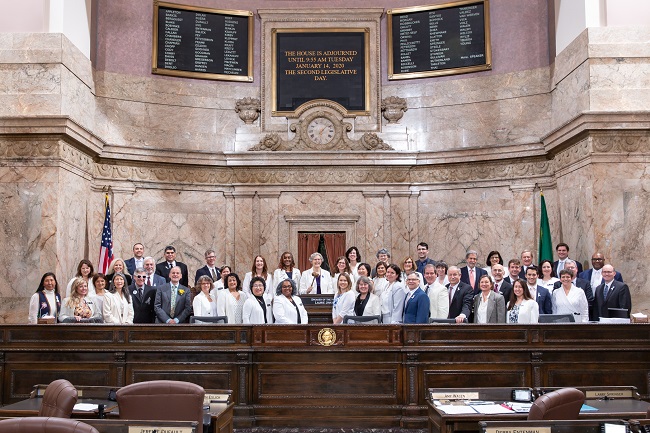Members of the Washington House of Representatives dressed in white to celebrate the first woman Speaker of the House