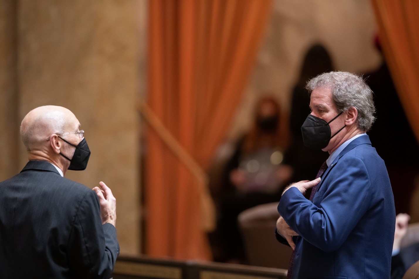 Reps. Roger Goodman and Larry Springer on the House floor