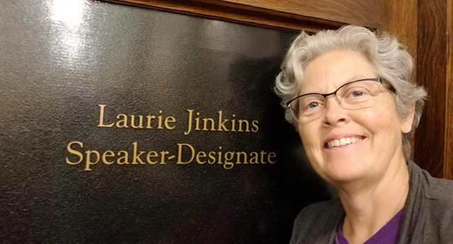 Speaker-designate Laurie Jinkins standing in front of her new office.