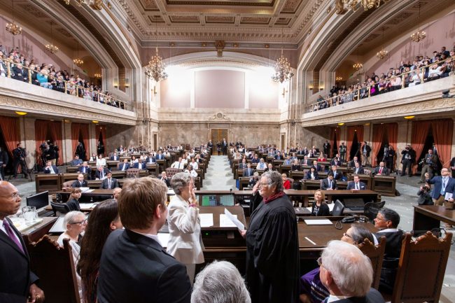 Speaker Jinkins is sworn in as the new Speaker of the House by Justice Mary Fairhurst with House of Reps members in background