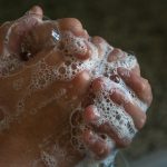 hands lathered with soap