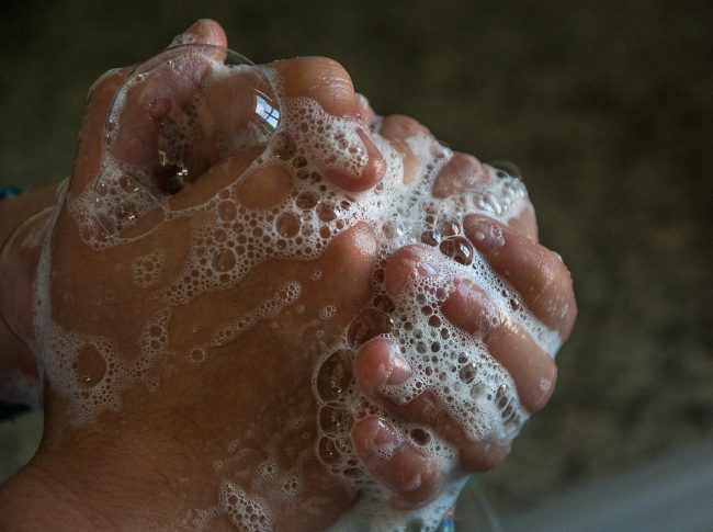 hands lathered with soap