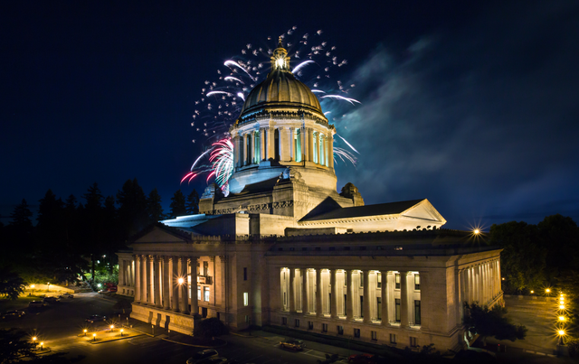 Fireworks at night over state capitol bldg