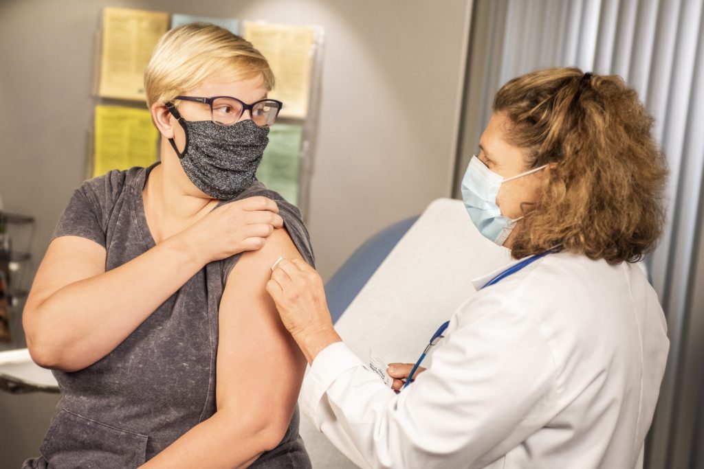 woman getting vaccine