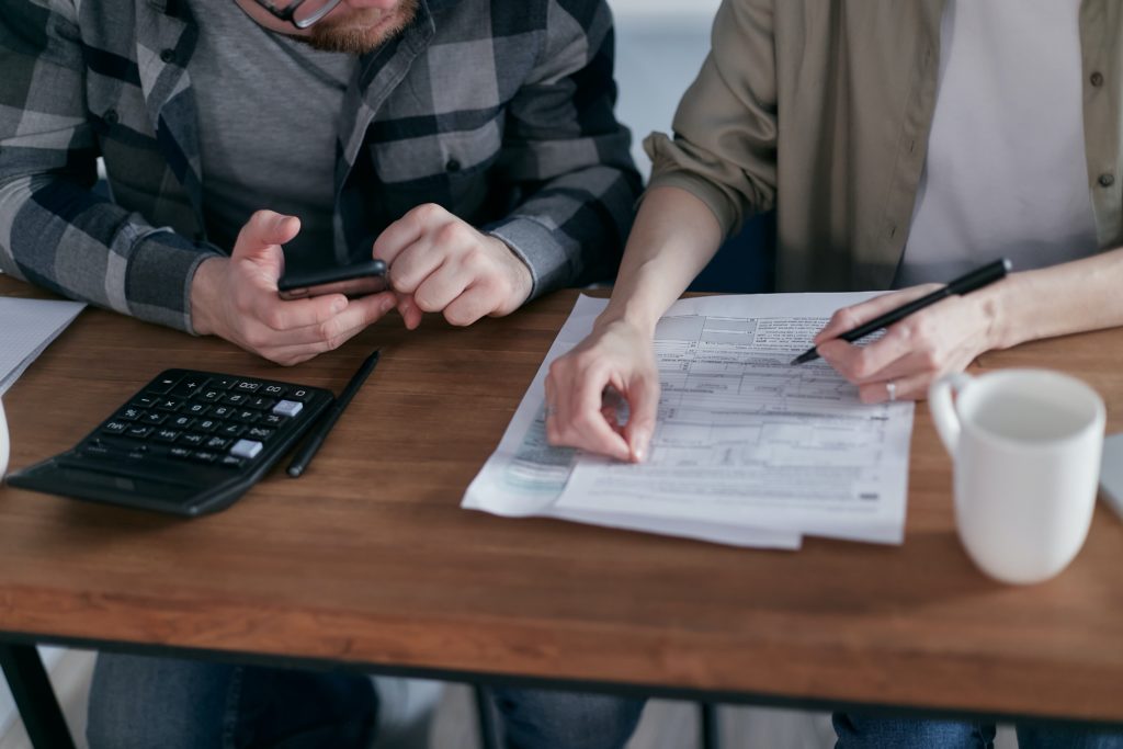 Image: Two people looking at paperwork