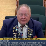 Paul Manly, state quartermaster for Veterans of Foreign Wars and bugler speaks to the committee