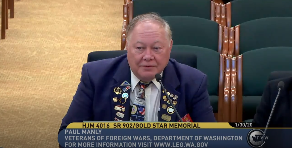 Paul Manly, state quartermaster for Veterans of Foreign Wars and bugler speaks to the committee