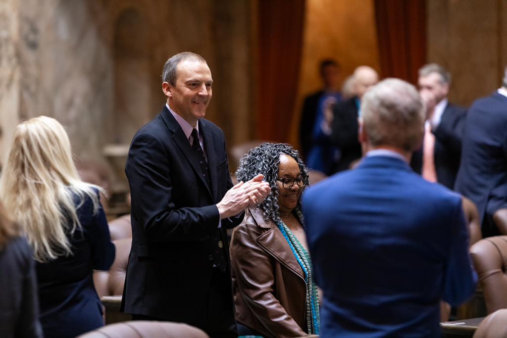 Rep. Riccelli standing on the floor of the House with Rep. Debra Entenman