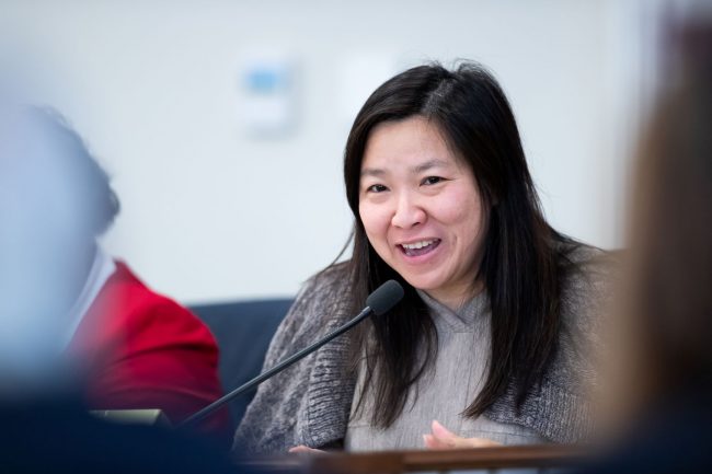 Rep. My-Linh Thai at dais with microphone