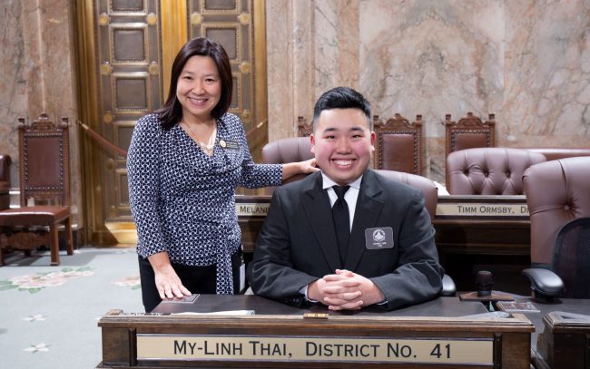 Rep. Thai with House page on House floor