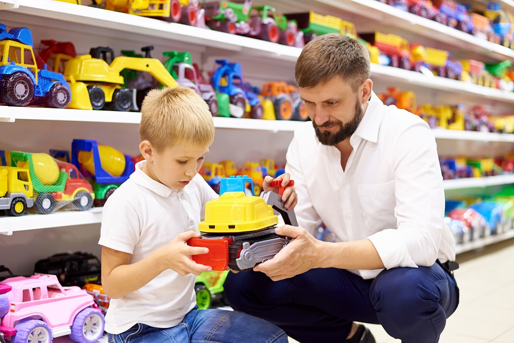 Father and son in a toy store.